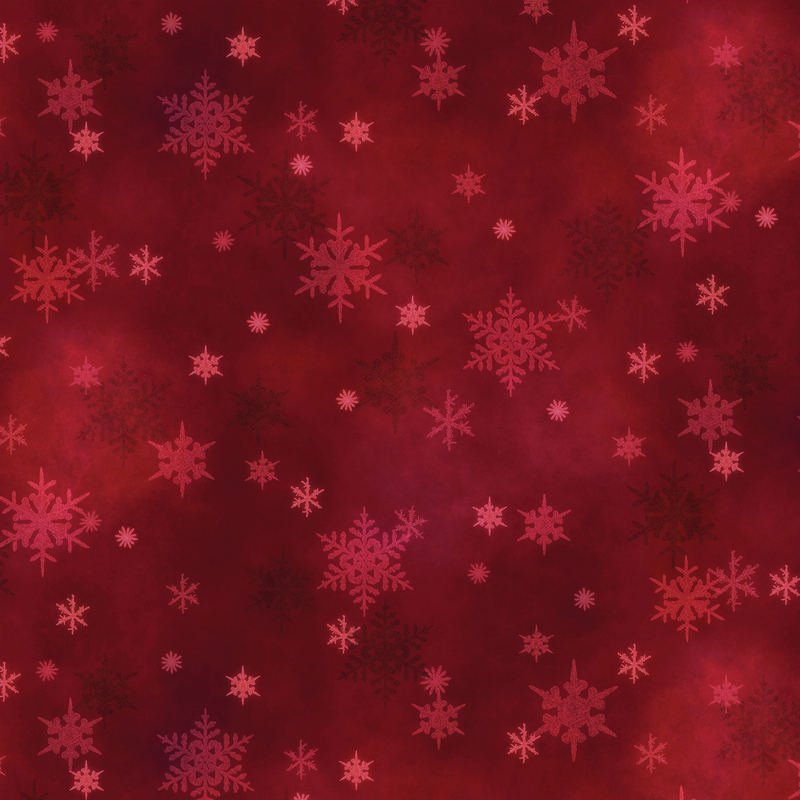 scarlet red mottled fabric featuring small scattered tonal snowflakes