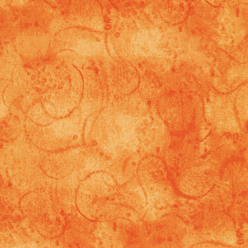 fabric featuring watercolor swirls on a orange mottled background