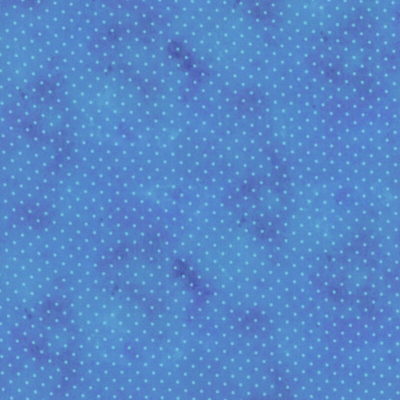 blue mottled fabric with light blue polka dots