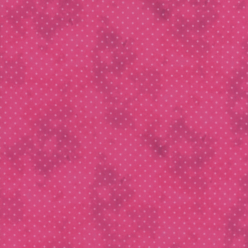 dark pink mottled fabric with light pink polka dots
