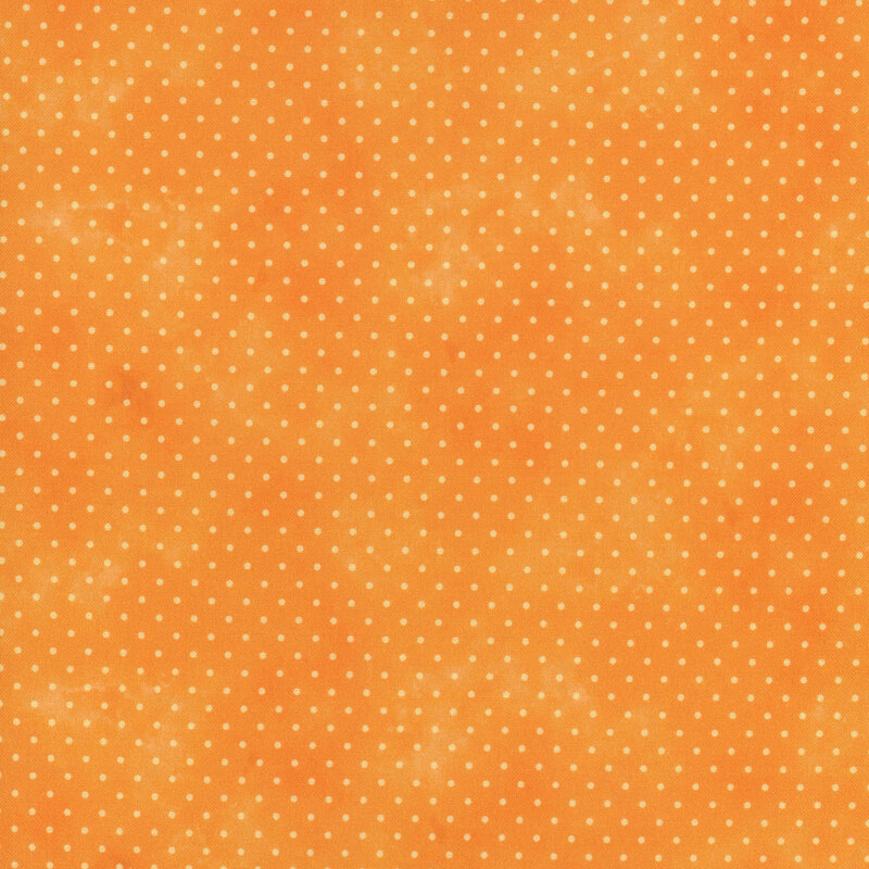 bright cheddar orange mottled fabric with light orange polka dots