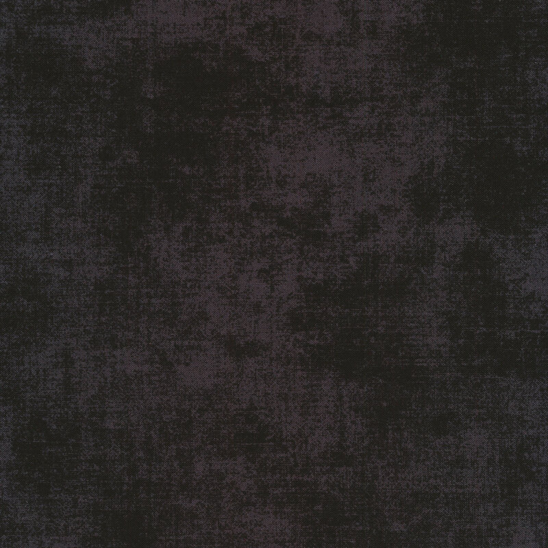 Black and dusty mauve textured fabric with a mottled design 