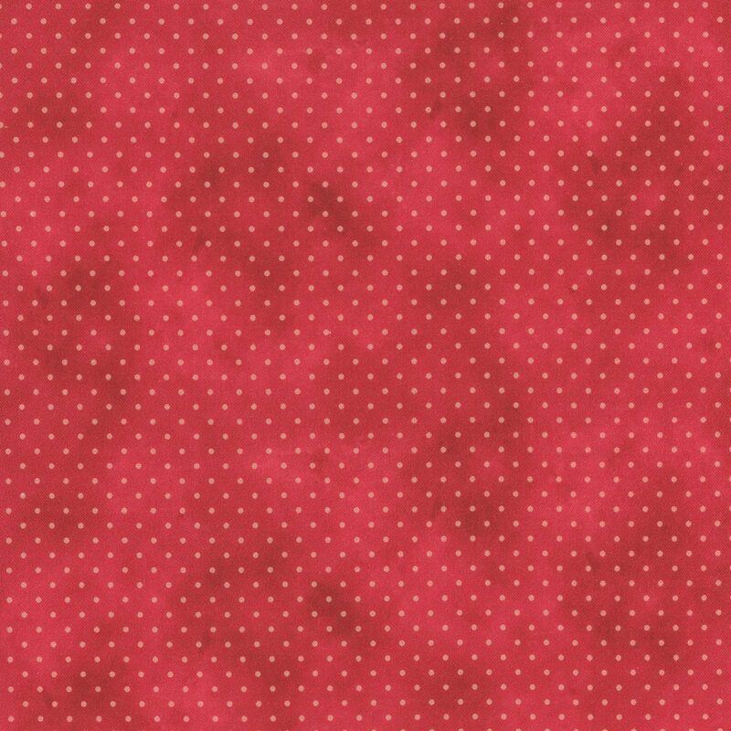 red mottled fabric with pale red polka dots
