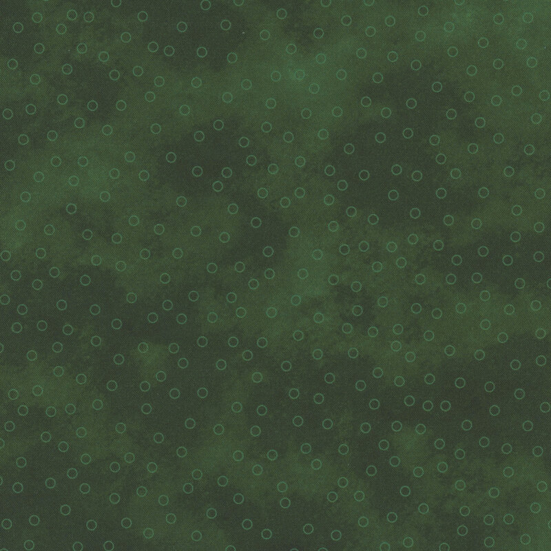 muted green mottled fabric with scattered light green circle outlines