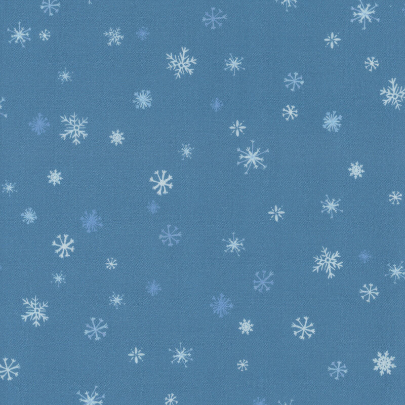 Blue fabric with white and light blue snowflakes.
