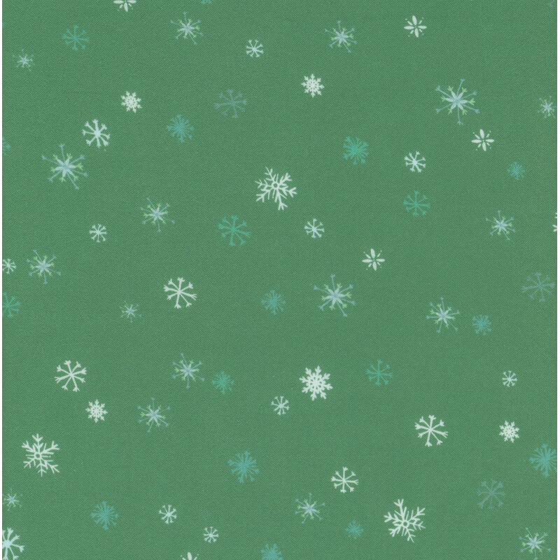 Green fabric with white and light green snowflakes.