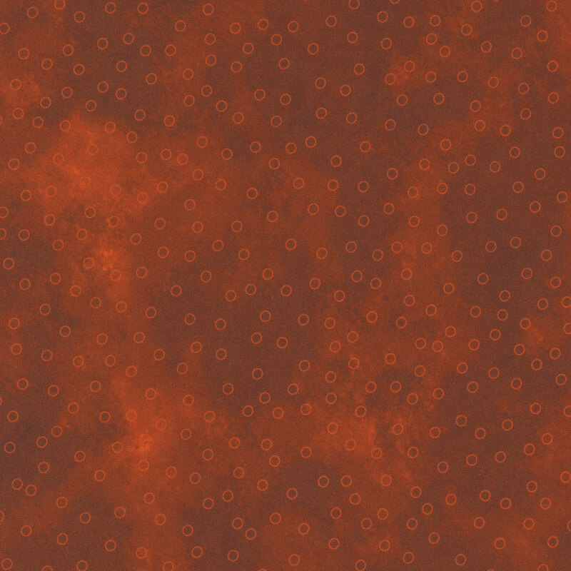 vibrant burnt orange mottled fabric with scattered orange circle outlines