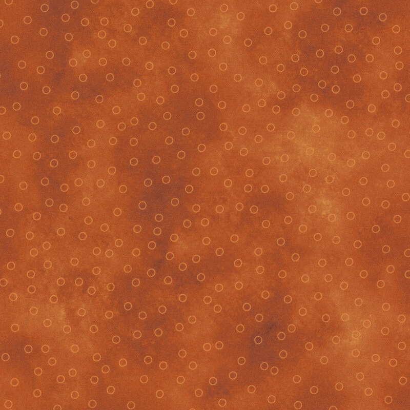 vibrant orange mottled fabric with scattered light orange circle outlines