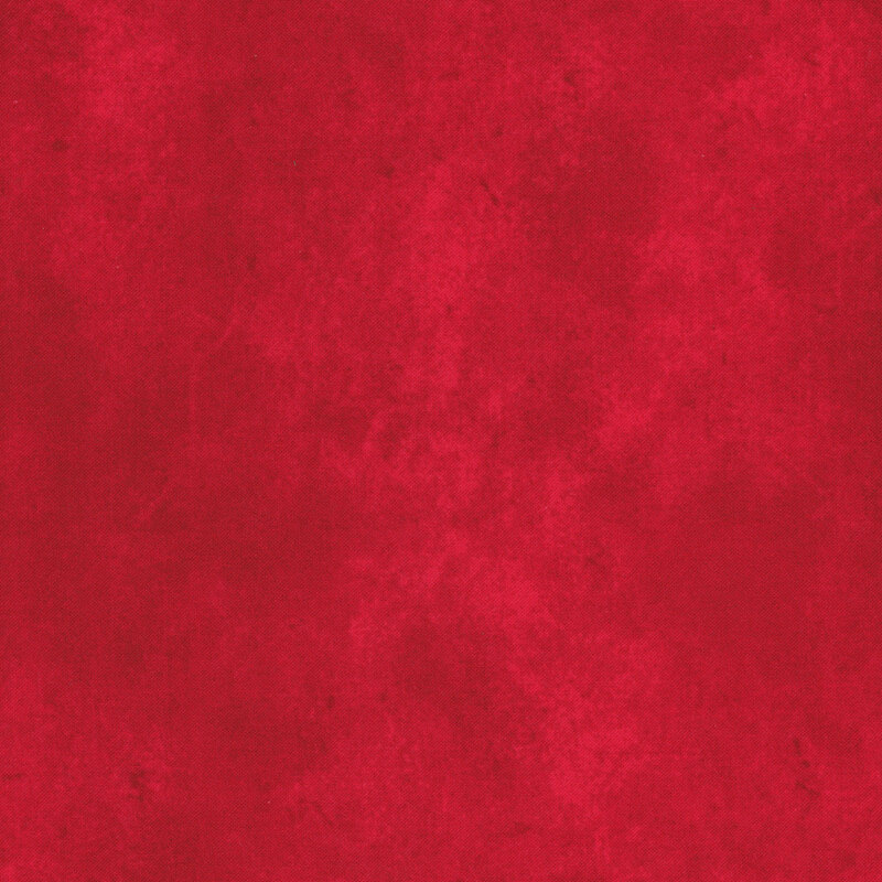 Mottled red suede textured fabric.