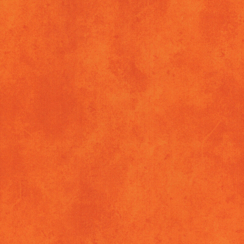 orange fabric with a lovely mottled suede texture