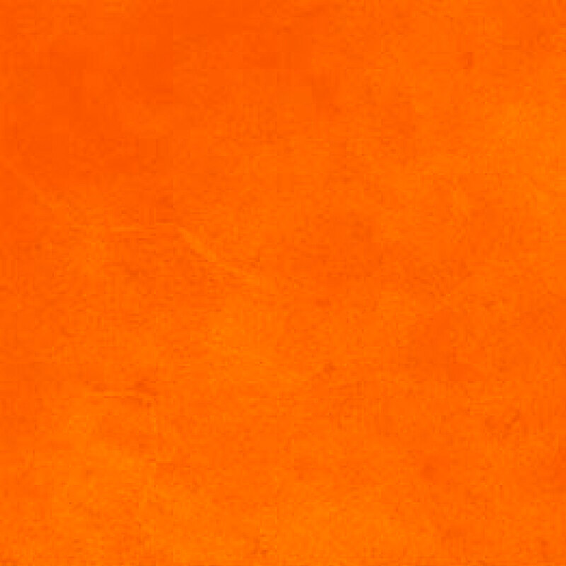 orange fabric with a lovely mottled suede texture