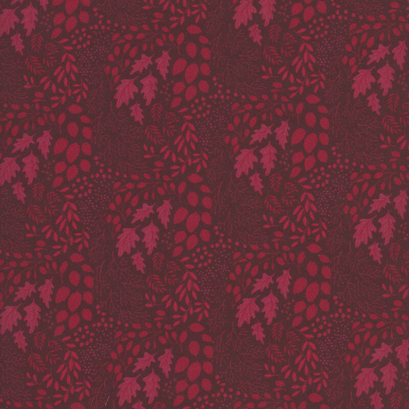 tonal fabric with various types of leaves in shades of purple