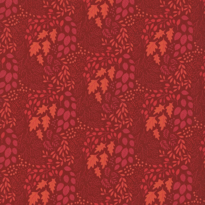 tonal fabric with various types of leaves in shades of red