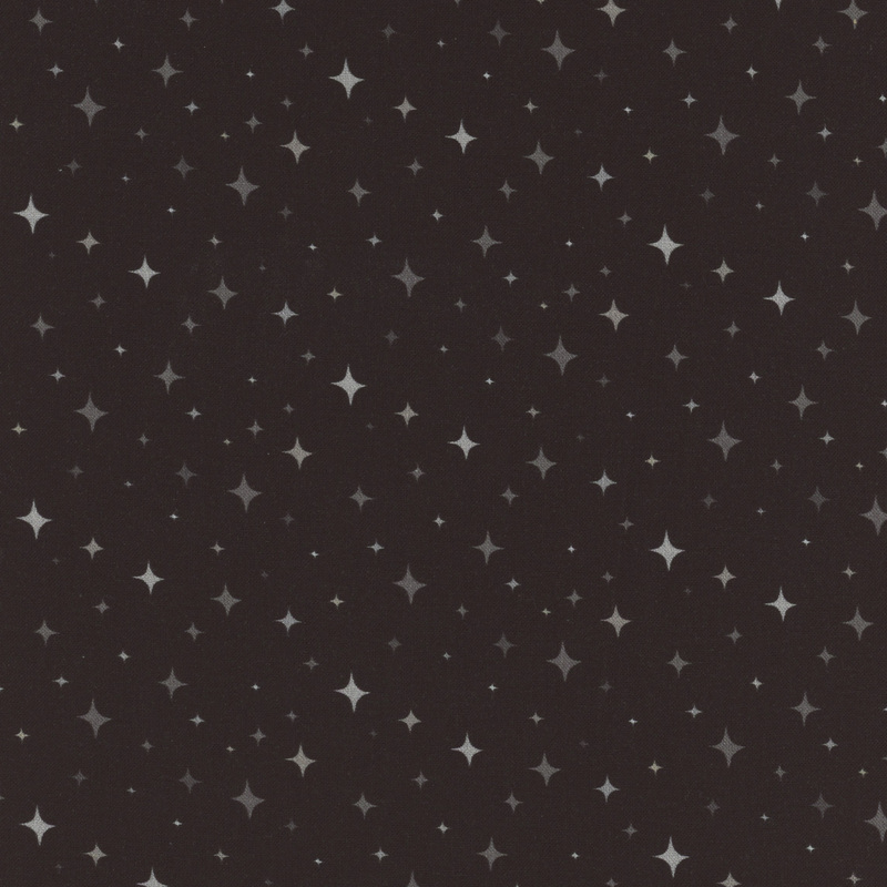 speckled black fabric with scattered gray tonal 4-pointed stars