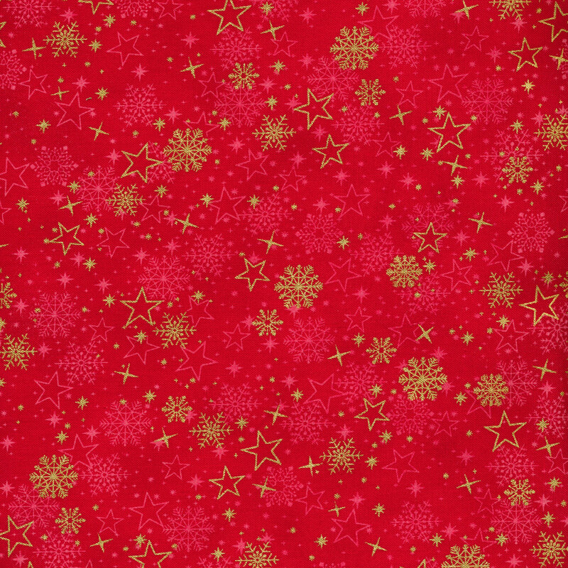 vivid red fabric featuring scattered tonal snowflakes and stars overlaid by metallic gold stars and snowflakes