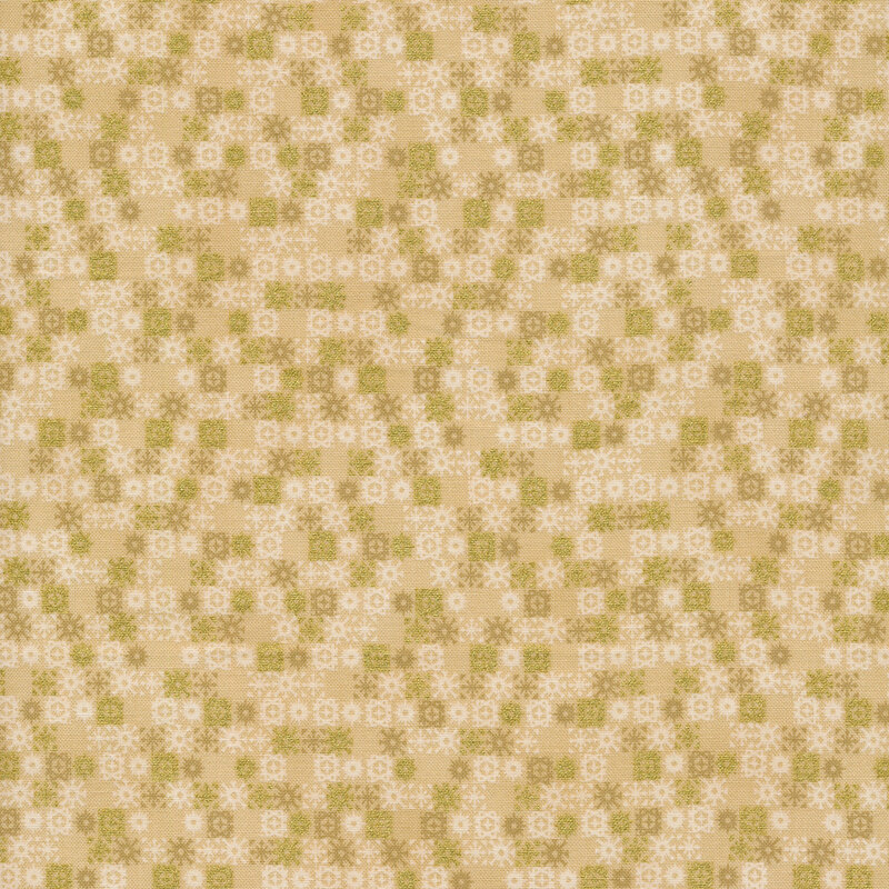 rich cream fabric featuring rows of geometric tan, white, and metallic gold snowflakes