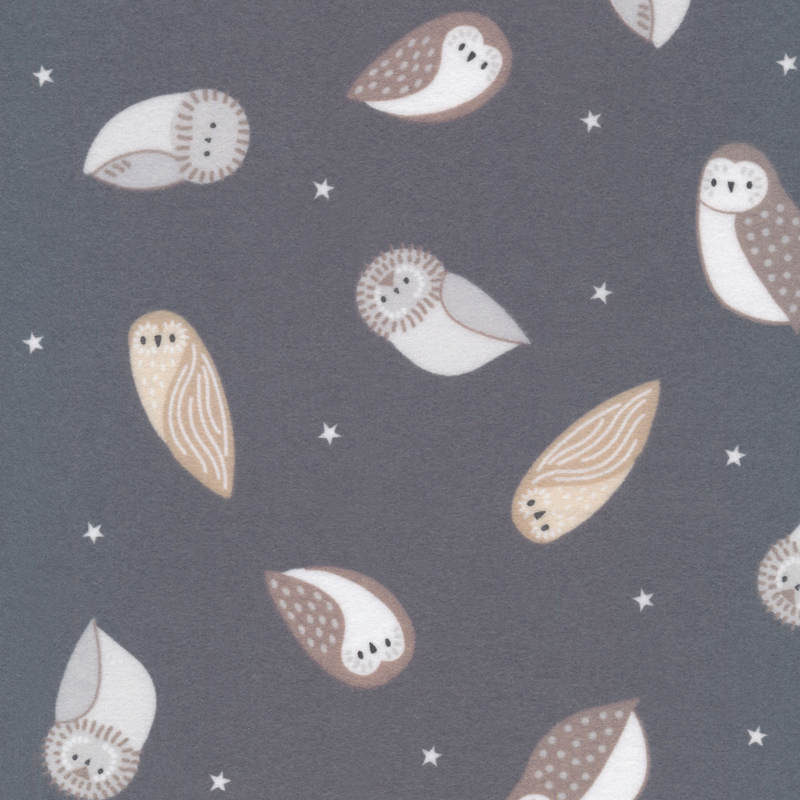 dark gray flannel fabric featuring scattered adorable tan, grey, and brown owls amidst white stars