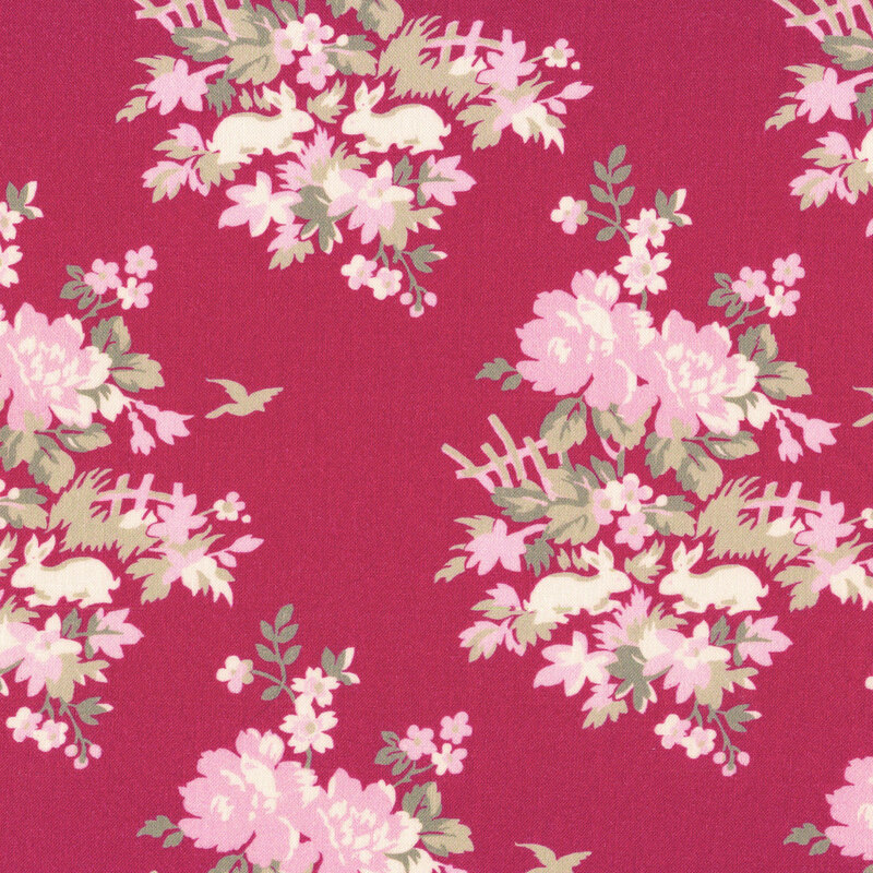 red fabric featuring pink flowers with bunnies and birds