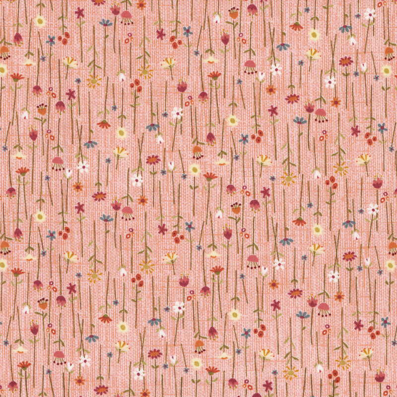 Pink fabric covered in vertical long-stemmed wild flowers
