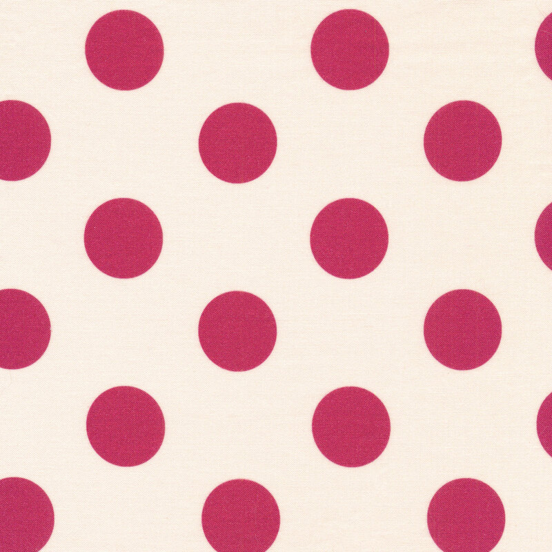 cream fabric featuring red polka dots