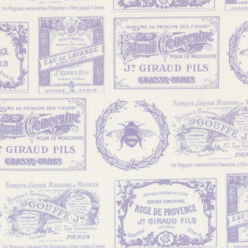 cream fabric featuring lilac blue vintage signs