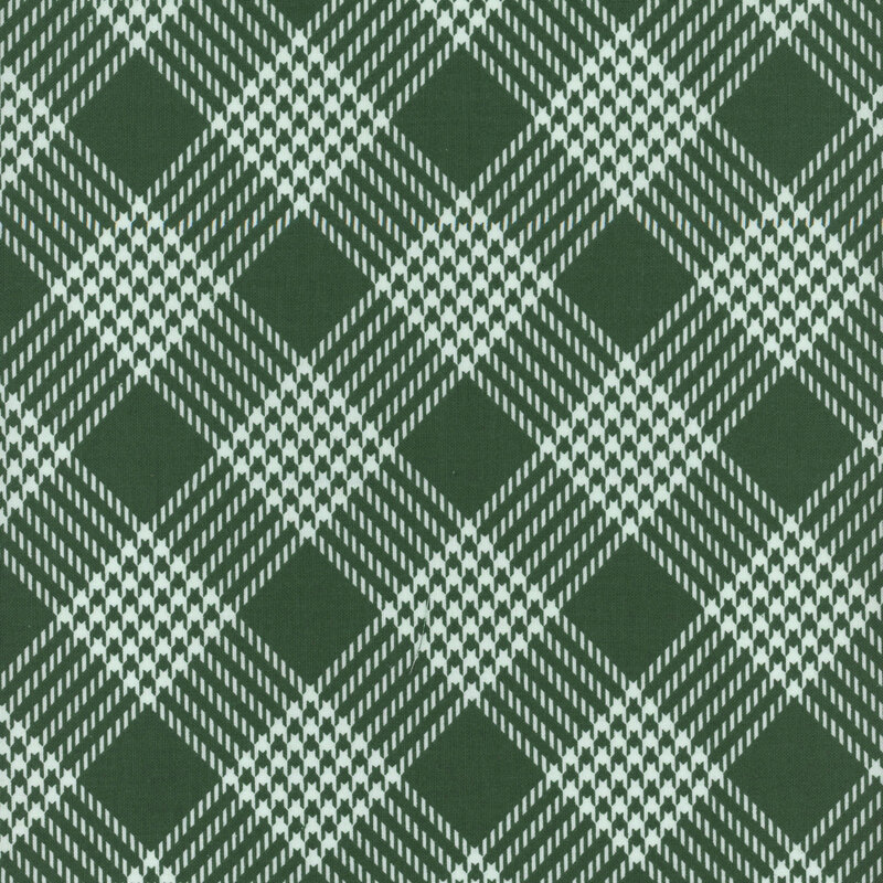 Green fabric with a cream-colored houndstooth plaid pattern.