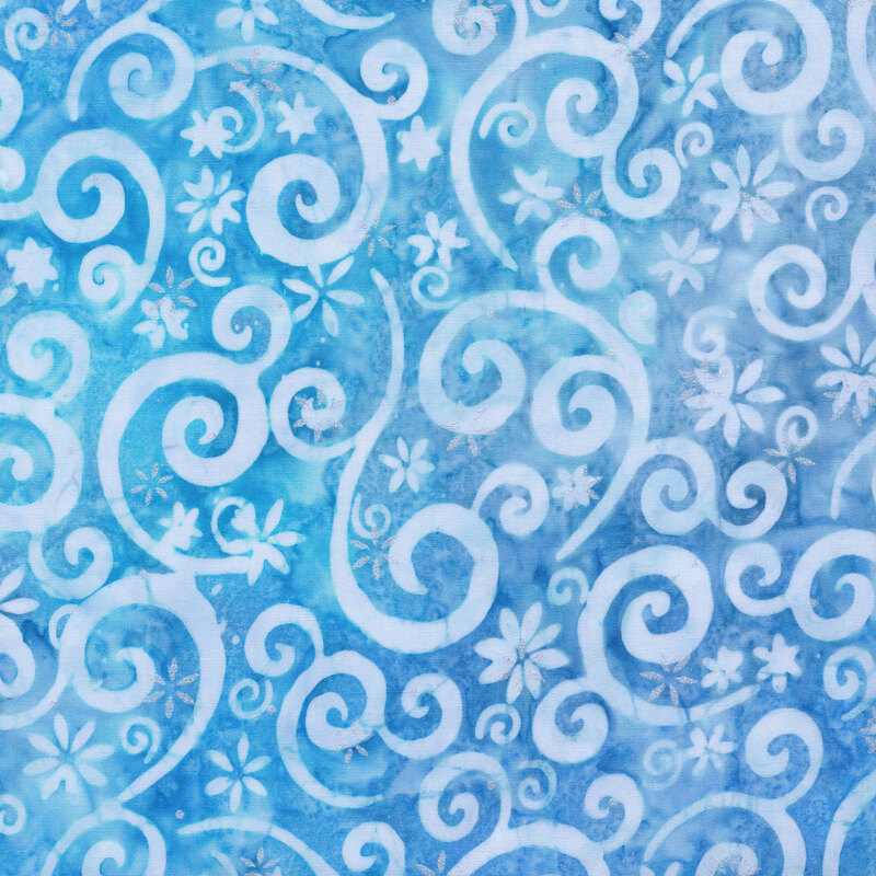 light blue mottled fabric featuring pastel blue swirling scrolls and snowflakes, accented with metallic silver snowflakes