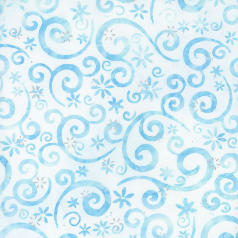 lightly mottled white fabric featuring light blue swirling scrolls and snowflakes, accented with metallic silver snowflakes