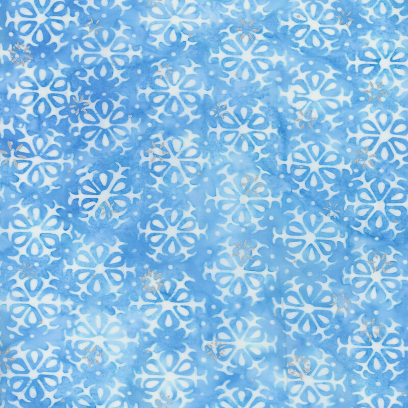 light blue mottled fabric featuring alternating rows of white snowflakes, accented with metallic silver snowflakes