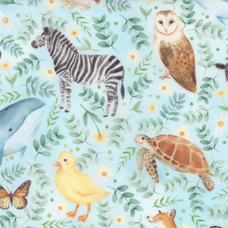 Light blue fabric featuring various animals surrounded by flowers and leaves 