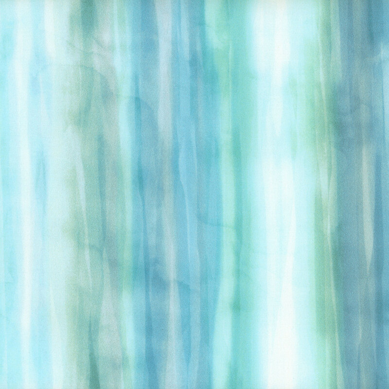 watercolor fabric in shades of blue, aqua, and teal
