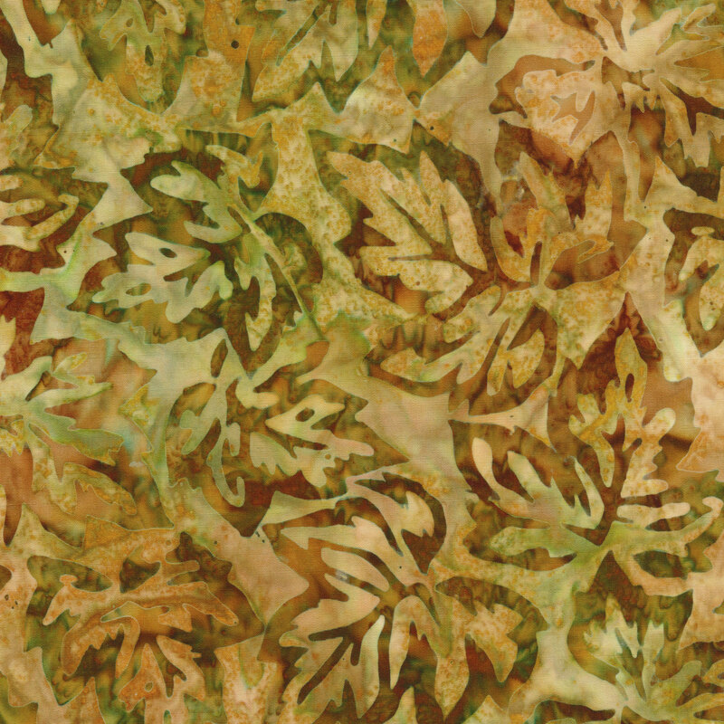olive green mottled fabric featuring scattered leaf outlines in shades of mottled brown and green