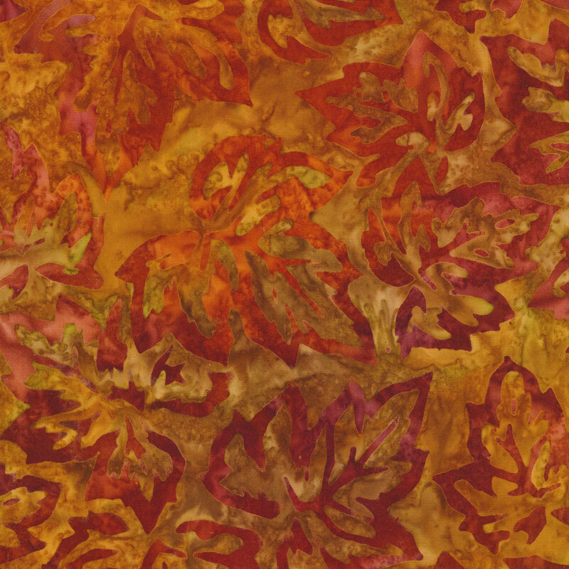 rich orange mottled fabric featuring scattered leaf outlines in shades of mottled red