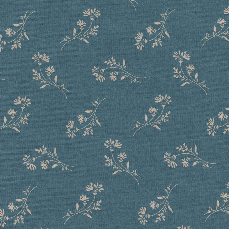 Dusty navy blue fabric with tossed florals in cream all over