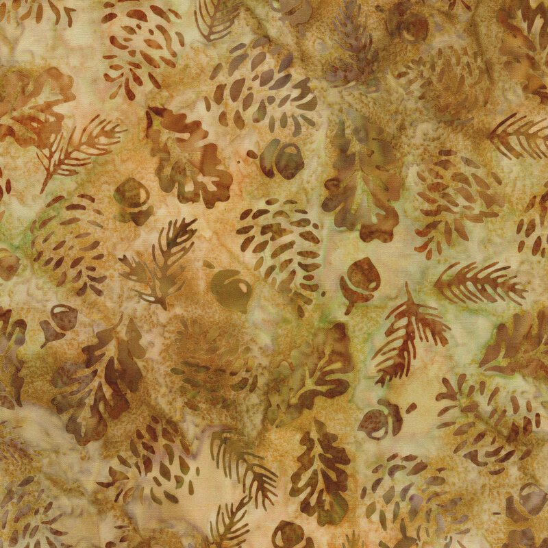 brown and green mottled fabric featuring scattered leaves, pine needles, pinecones, and acorns in shades of mottled brown