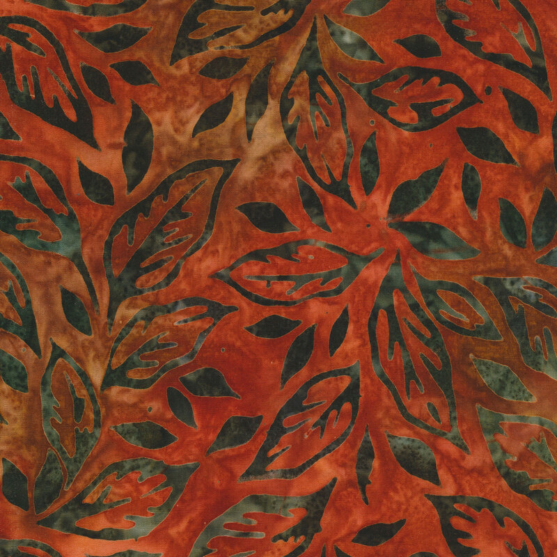 fiery red mottled fabric featuring scattered leaves in shades of mottled green