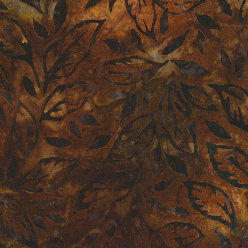 brown mottled fabric featuring scattered leaves in shades of mottled dark brown