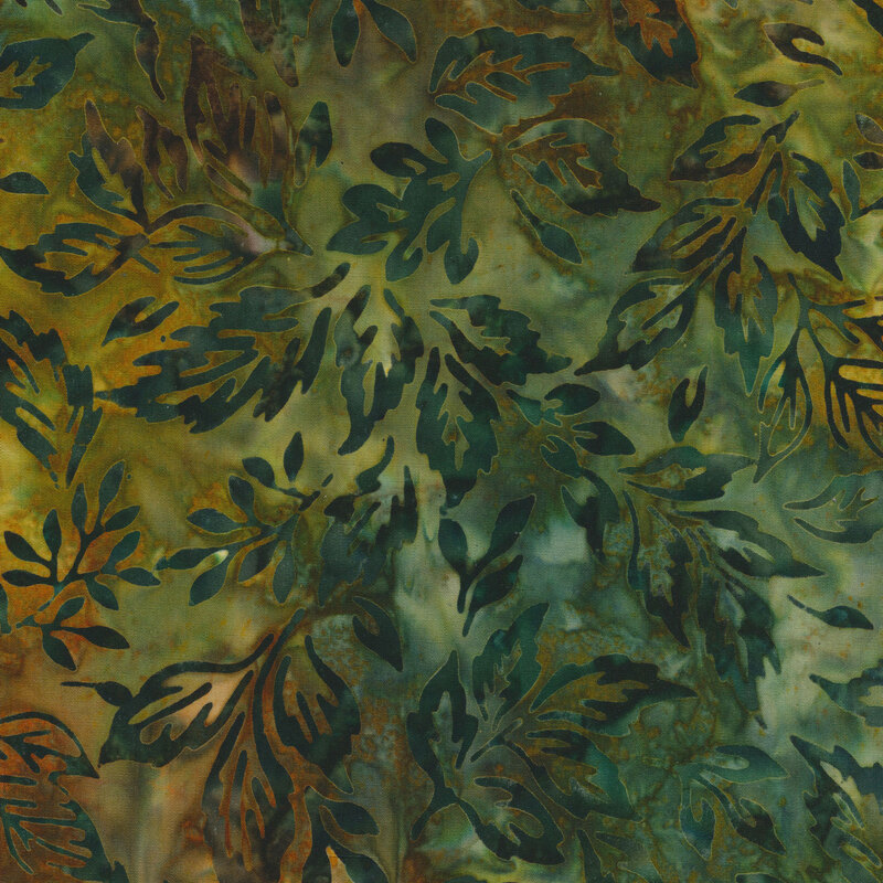 emerald and olive green mottled fabric featuring scattered leaves in shades of mottled emerald green