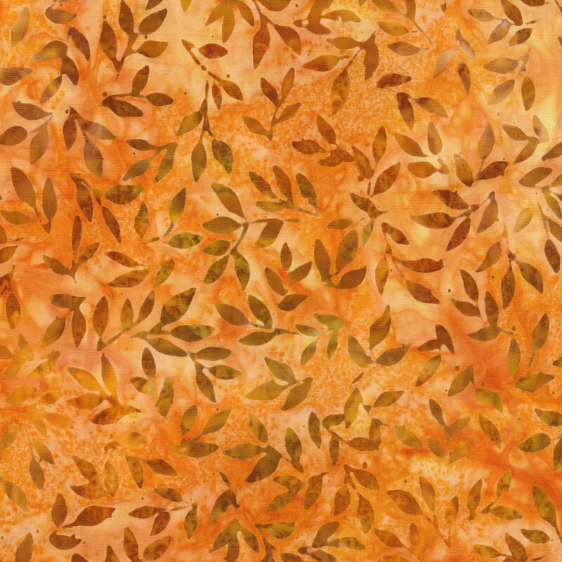 orange mottled fabric featuring scattered leaves and vines in shades of mottled brown and yellow