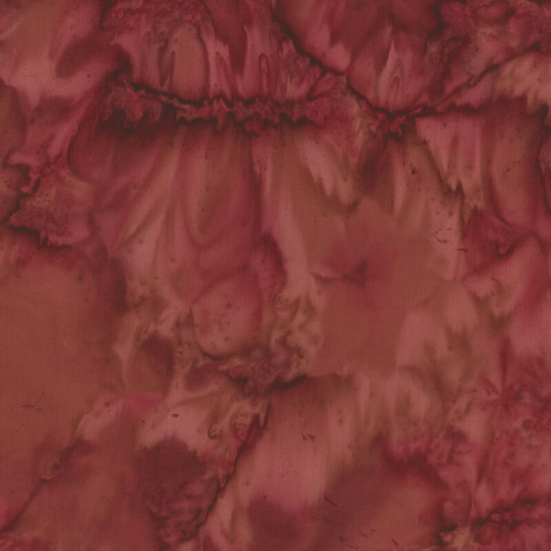 Red and brown mottled watercolor-like fabric