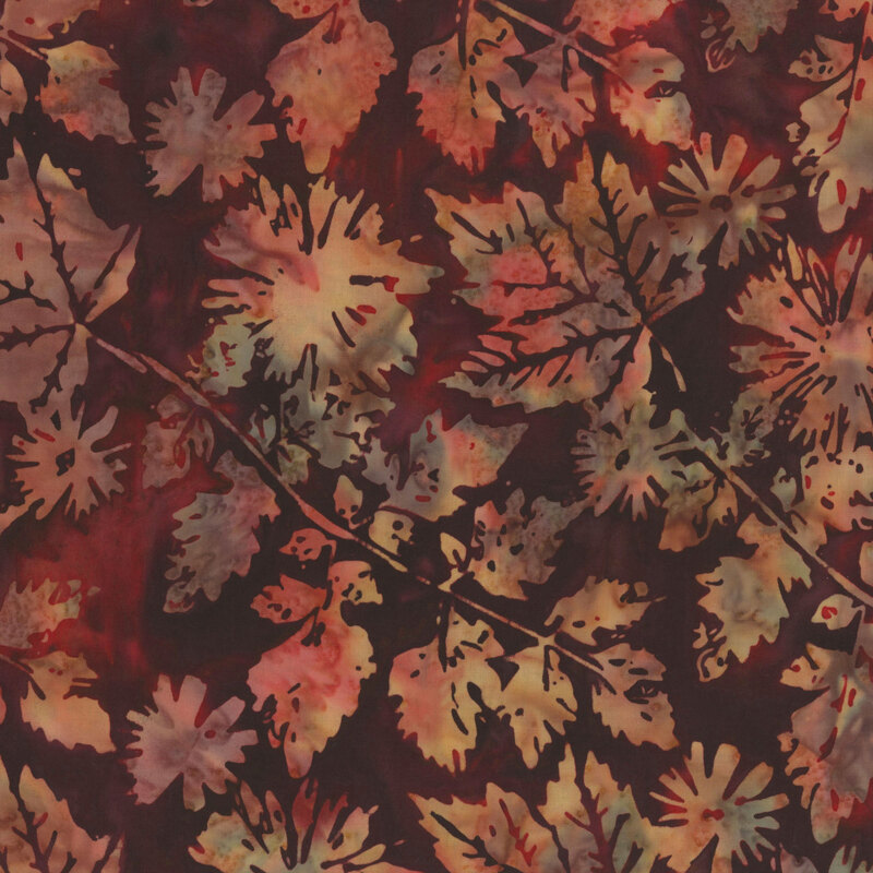Dark magenta and black mottled fabric with light brown and red mottled leaves all over