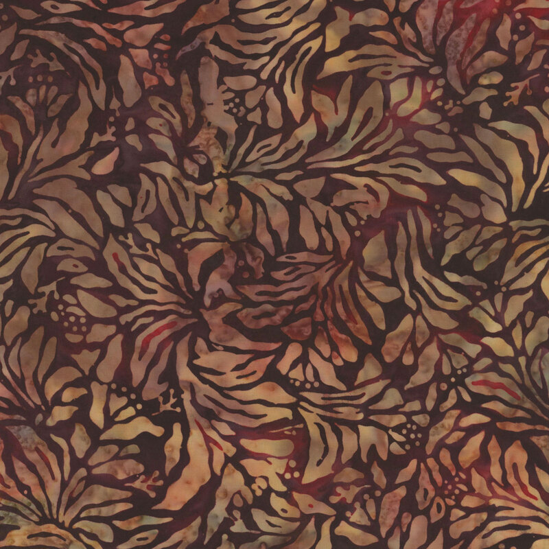 Mottled red and brown fabric with swirling leaf motifs packed together