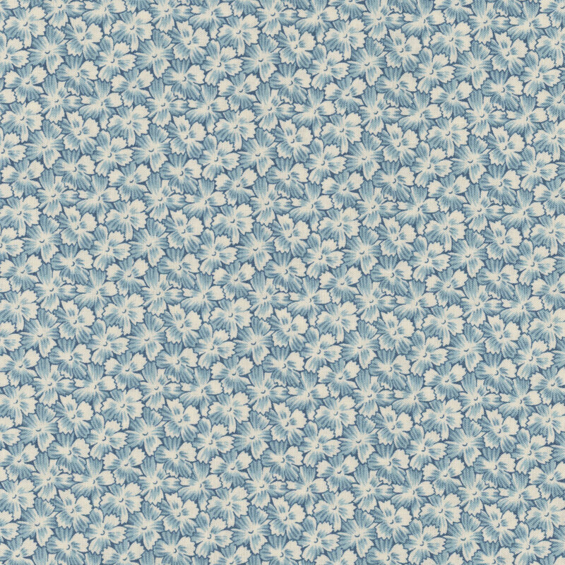Blue and cream fabric featuring flowers stacked on one another