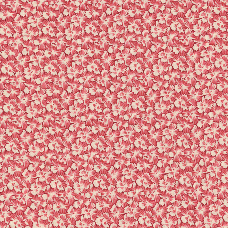 Pink and cream fabric with packed florals throughout