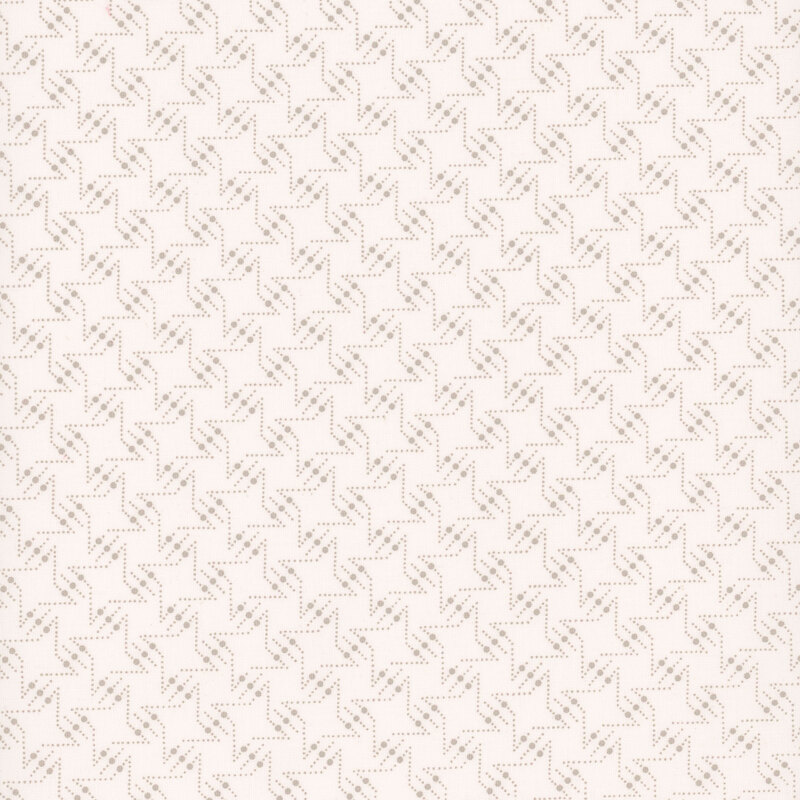 light cream fabric featuring a repeated geometric star pattern throughout
