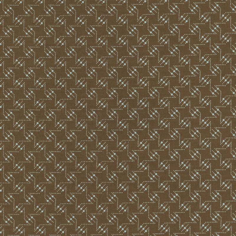 dark brown fabric featuring a light blue geometric star pattern throughout