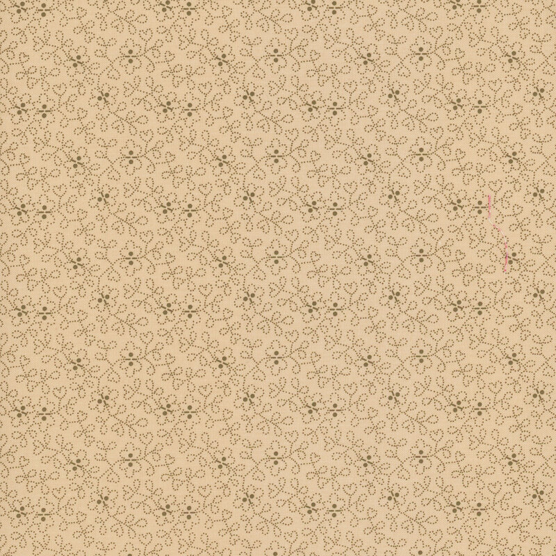light tan fabric with a swirled floral design throughout