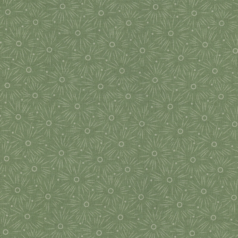 Tonal forest green fabric with a polka dotted starburst pattern throughout