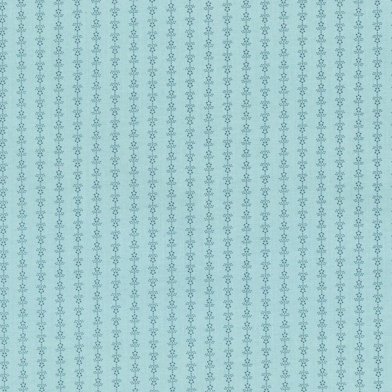 light blue tonal fabric featuring small flowers in a striped arrangement
