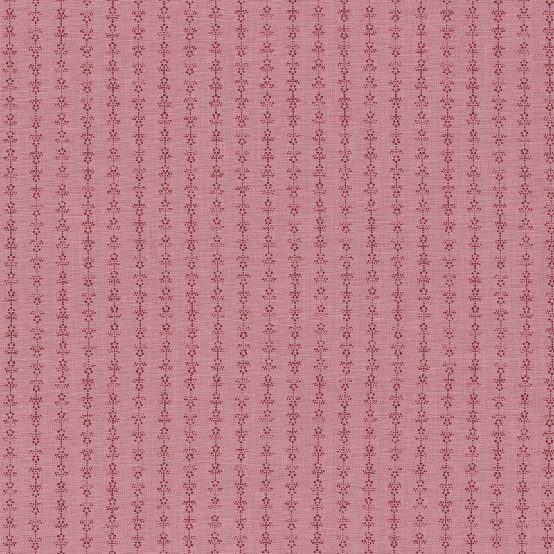 tonal pink fabric featuring small flowers in a striped arrangement